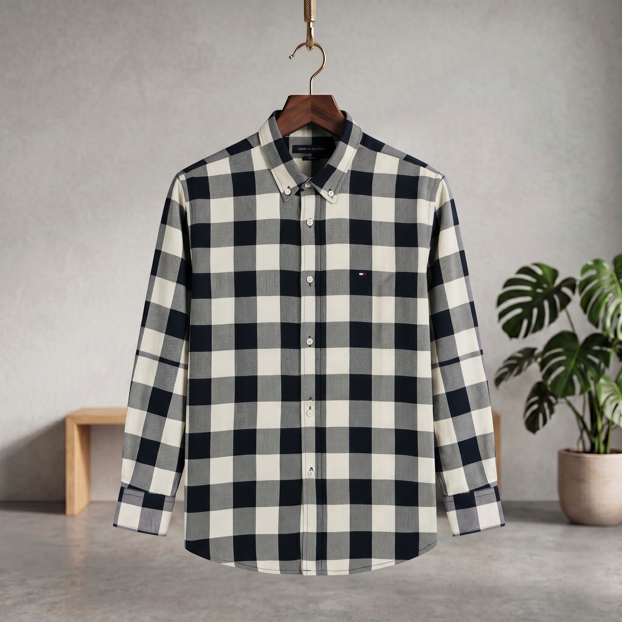 Check shirt in navy and white plaid with button-up front and long sleeves