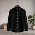 Black corduroy button-up shirt with pointed collar and long sleeves