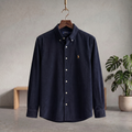 Navy corduroy button-up shirt with pointed collar and front buttons
