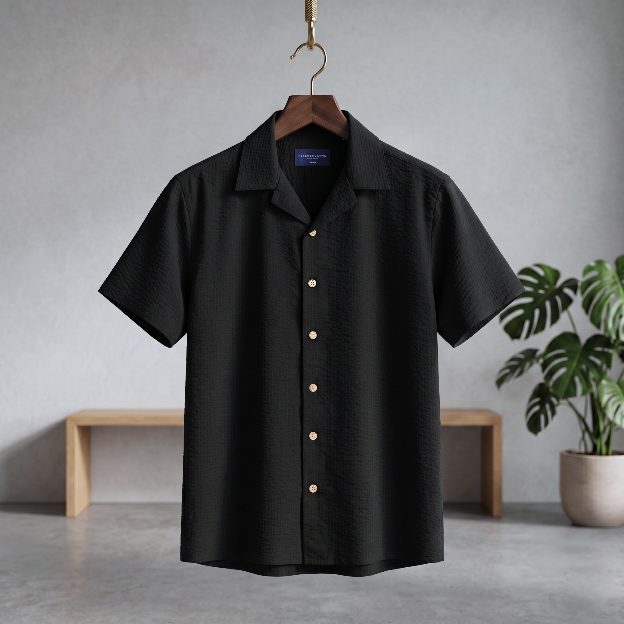 Seersucker Cuban half shirt, black textured fabric, short sleeves, button-front.