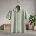 Light green seersucker Cuban half shirt with button front and short sleeves