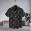 Black seersucker Cuban half shirt with short sleeves, button-front and subtle allover print