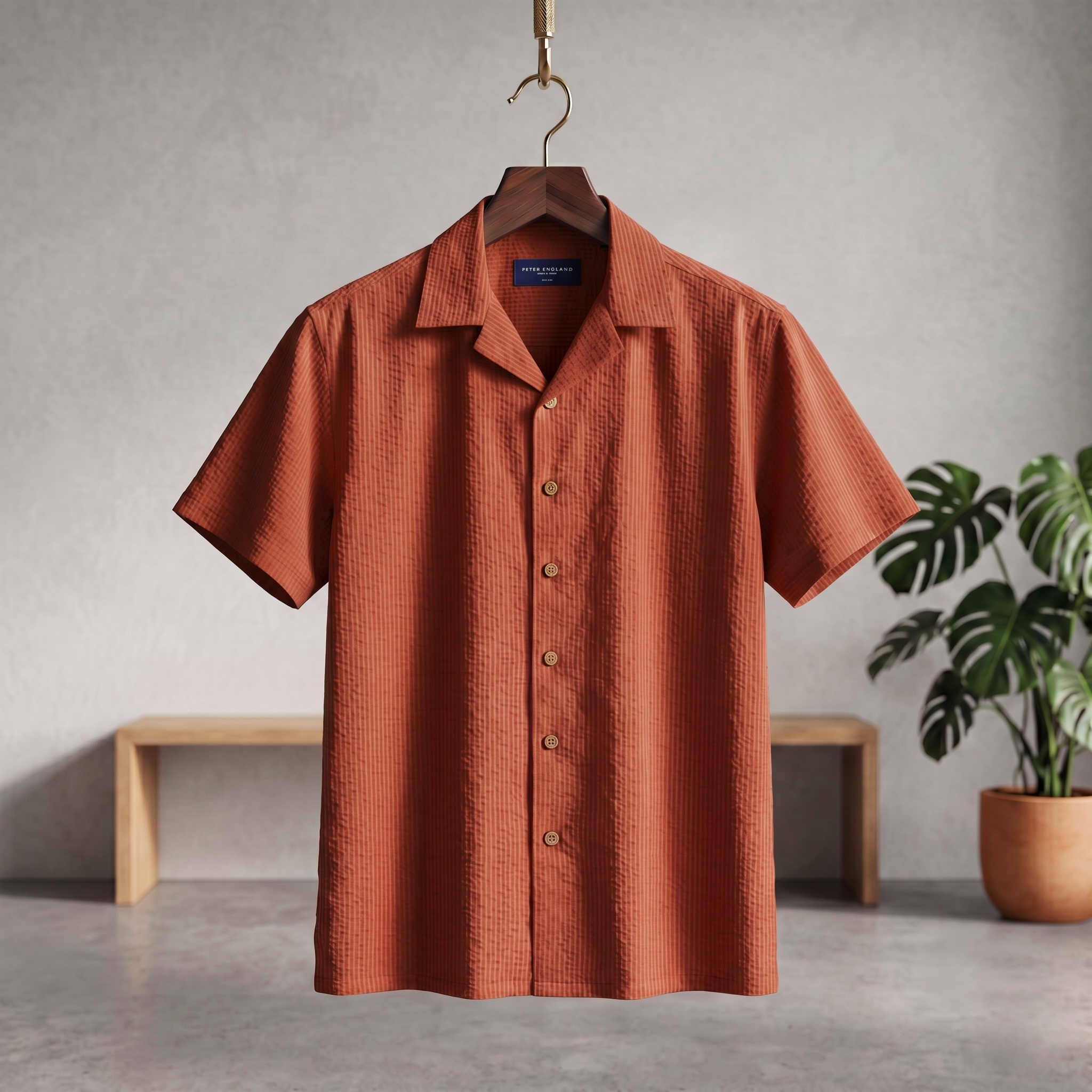 Orange seersucker Cuban half shirt with short sleeves and button front
