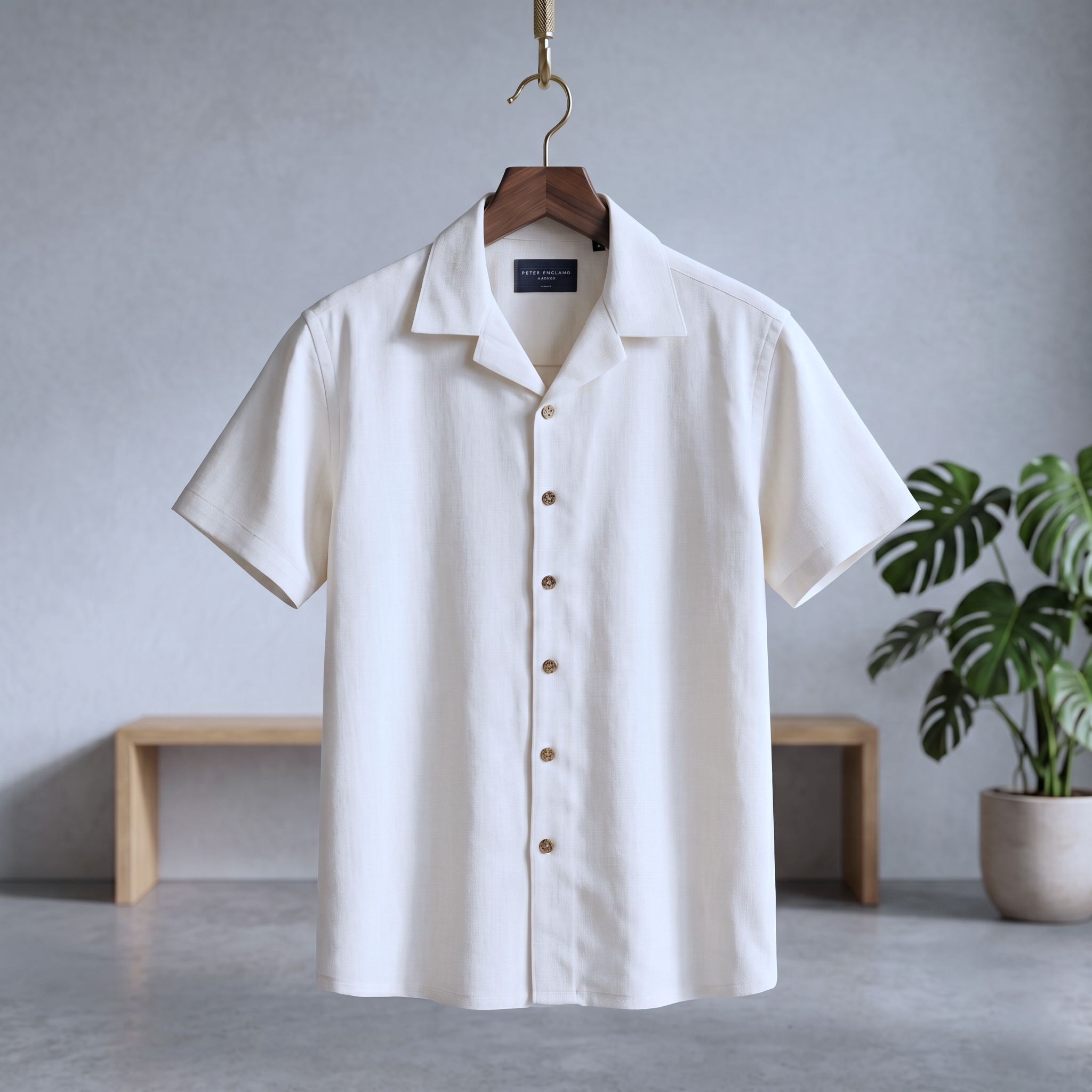 White short-sleeve button-up shirt with pointed collar and front buttons