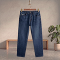 Blue denim jeans with straight legs, front pockets, button and zip closure