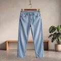 Light blue denim jeans with belt loops, button-fly front, and straight legs.
