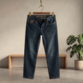 Dark blue denim jeans with straight leg, belt loops, button fly, U.S. Polo Assn label
