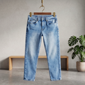 Light blue denim jeans with straight leg and button fly