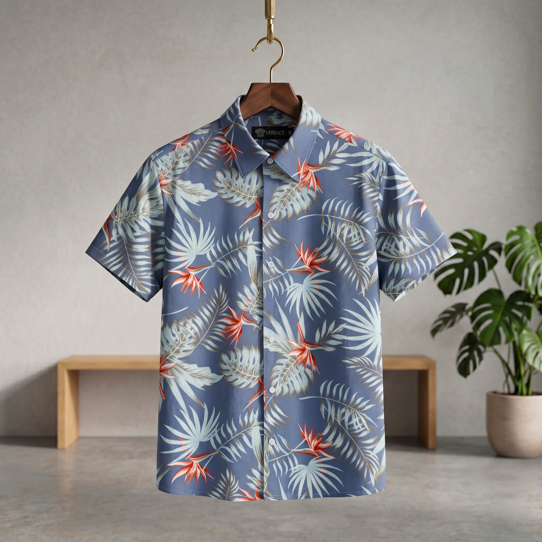 Blue Hawaiian half shirt with floral leaf print, collared short-sleeve button-front