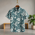 Teal short-sleeve Hawaiian half shirt with white floral print and button front