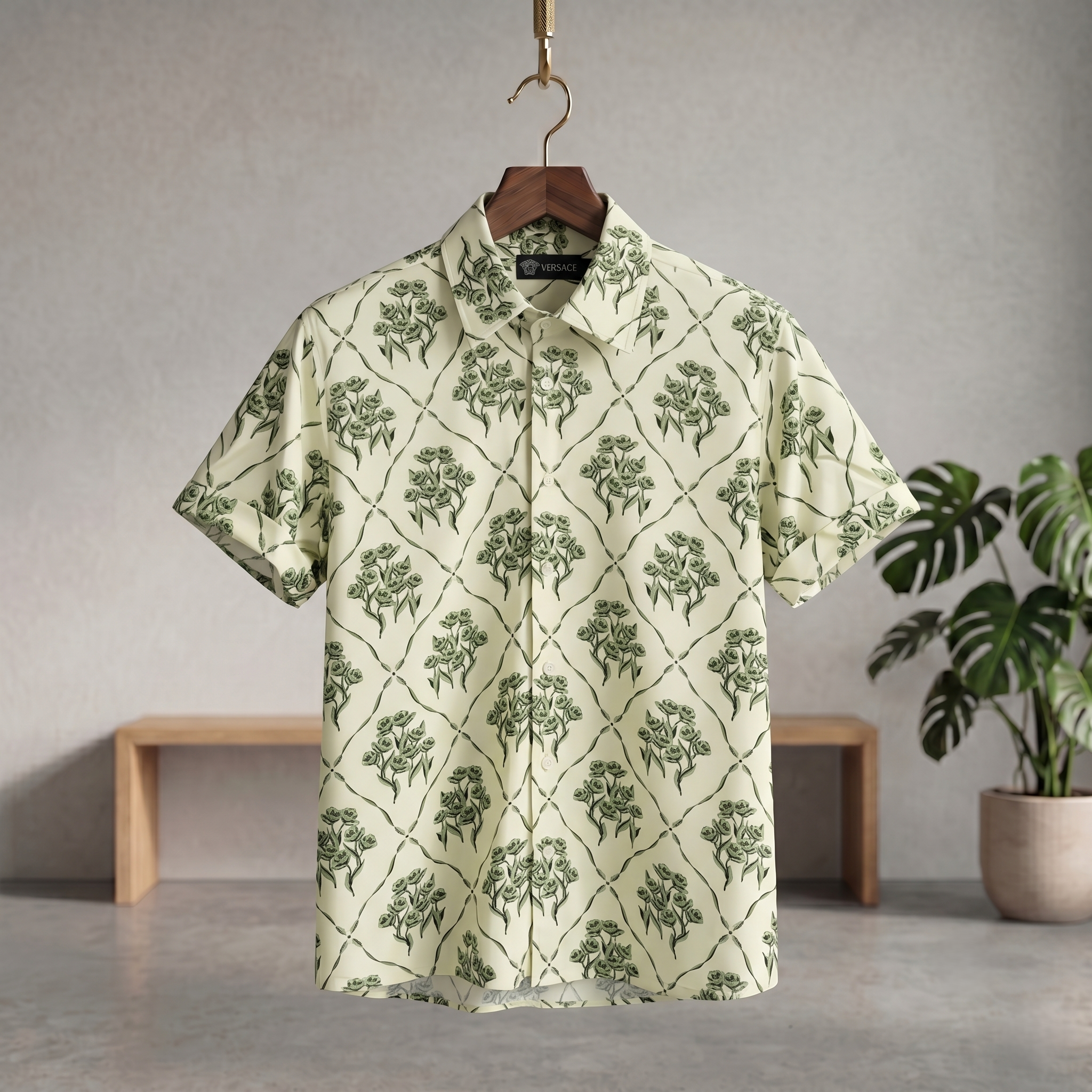 Cream Hawaiian shirt with green floral print, short sleeves and button front