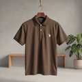Dark brown polo T-shirt with button placket, collar, short sleeves, and chest logo