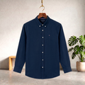 Dark blue solid button-up shirt with long sleeves and front buttons