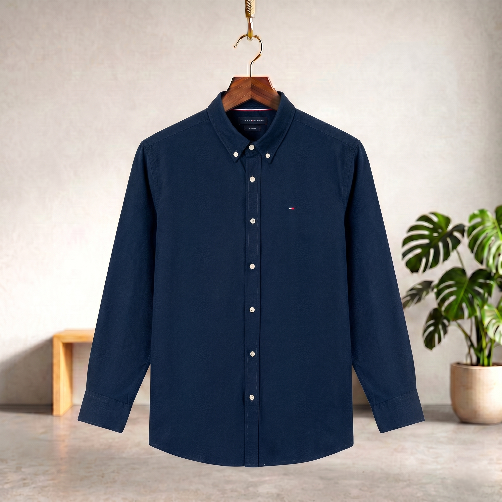 Dark blue solid button-up shirt with long sleeves and front buttons